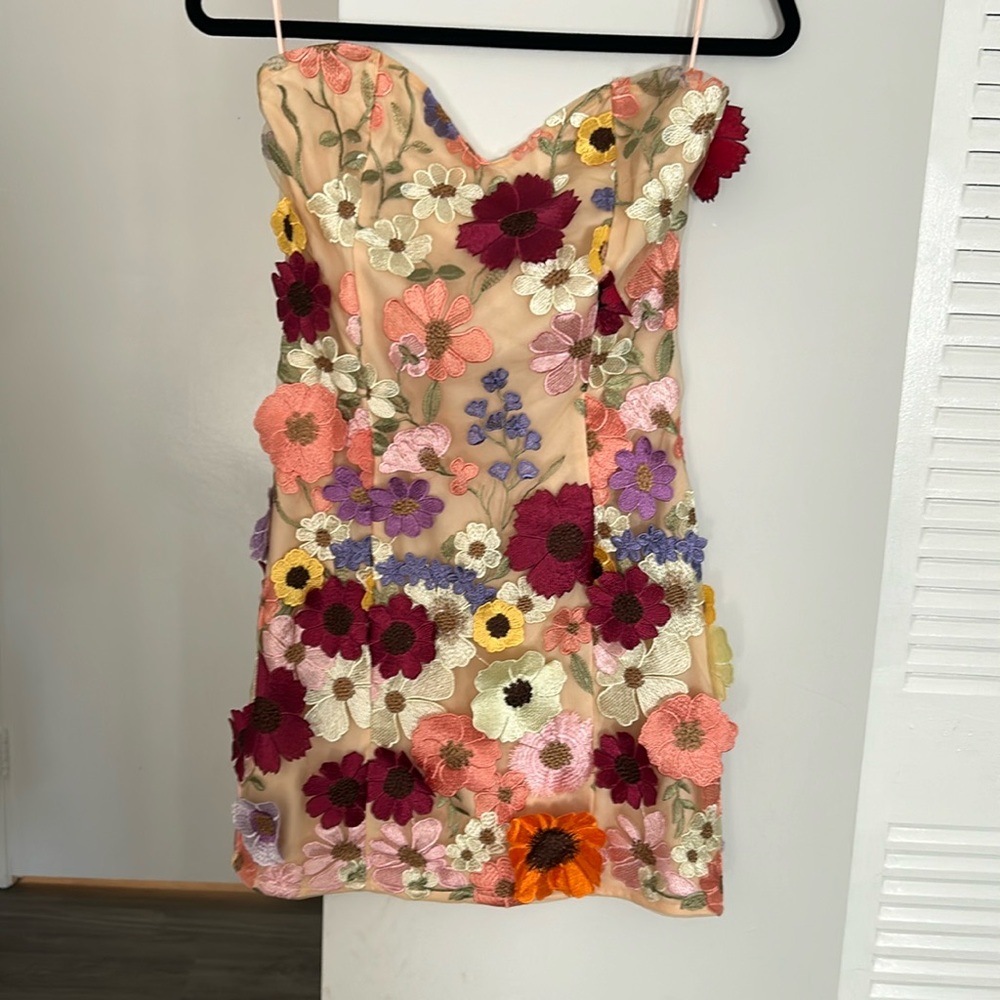 Mini dress with floral patch on